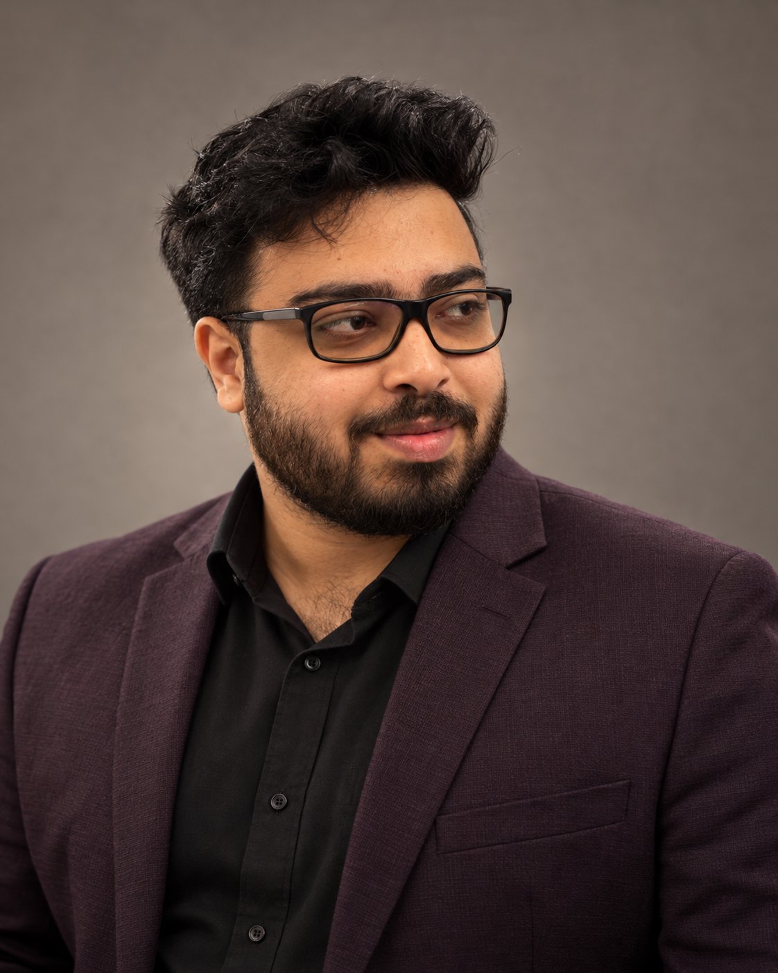 Amitrosudan Basu in a plum blazer